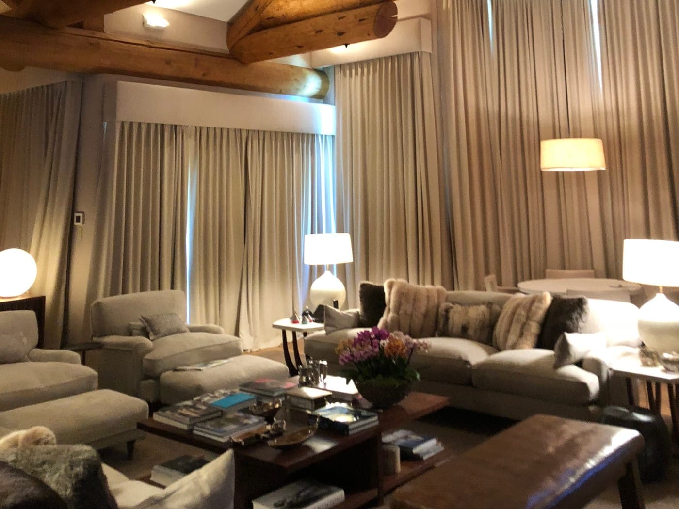 Warm Aspen home interior with painted walls, wood beams, and finished living space